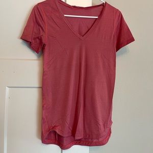 Pink lululemon running shirt
